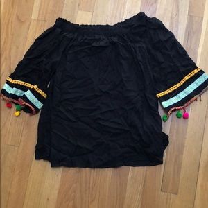 Off the shoulder pom pom shirt